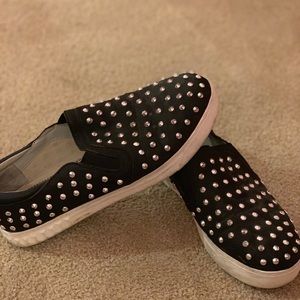 Black loafers with silver studs